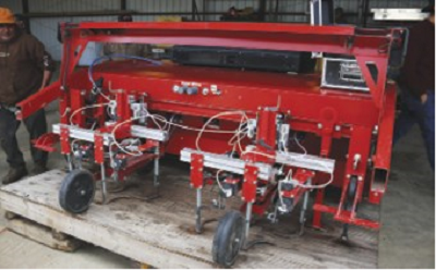 This Steketee automatic weeder was on display at a recent field day. Equipment like this is designed to remove weeds from row crops without damaging the crop. (photo Wenhao Su)