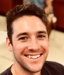 Man smiles for camera