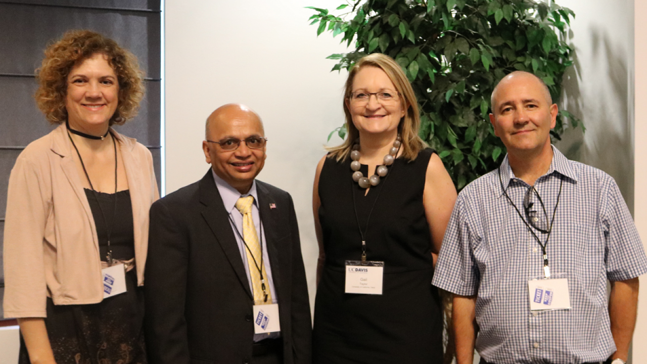 Conference chair Maeli Melotto (Plant Sciences professor, UC Davis), Parag Chitnis (USDA NIFA deputy director), Gail Taylor (Plant Sciences chair and professor, UC Davis), and co-chair Allen Van Deynze (Plant Sciences researcher, UC Davis) at the Breeding Crops for Enhanced Food Safety conference at UC Davis.