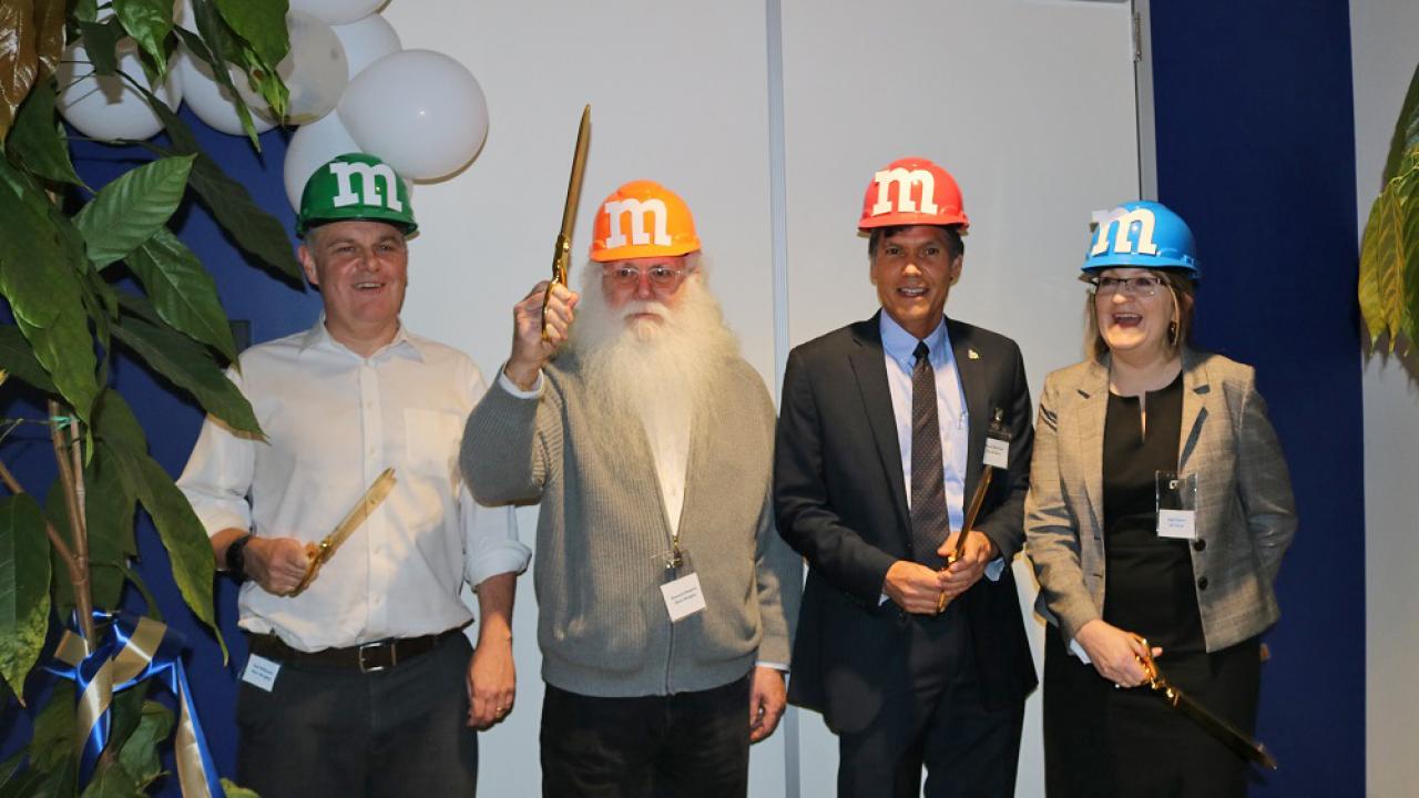 Ribbon-cutting at Mars' new research facility in Davis. From left, Neil Willcocks and Howard-Yana Shapiro (Mars Wrigley), Brett Lee (mayor of Davis), Gail Taylor (chair of Plant Sciences, UC Davis)