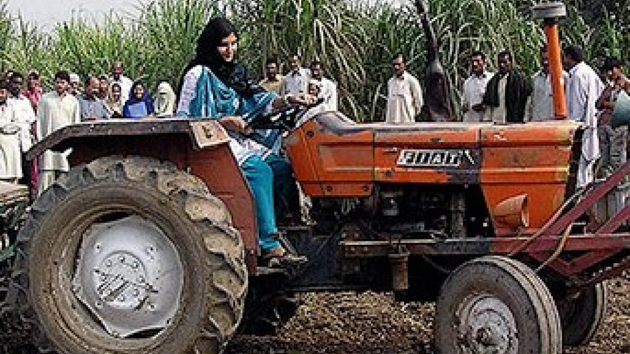 Farmer on tractor in Pakistan