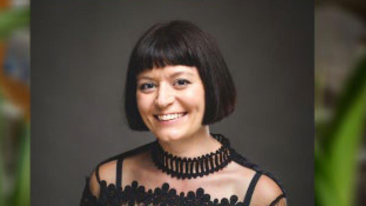Head shot of a woman smiling
