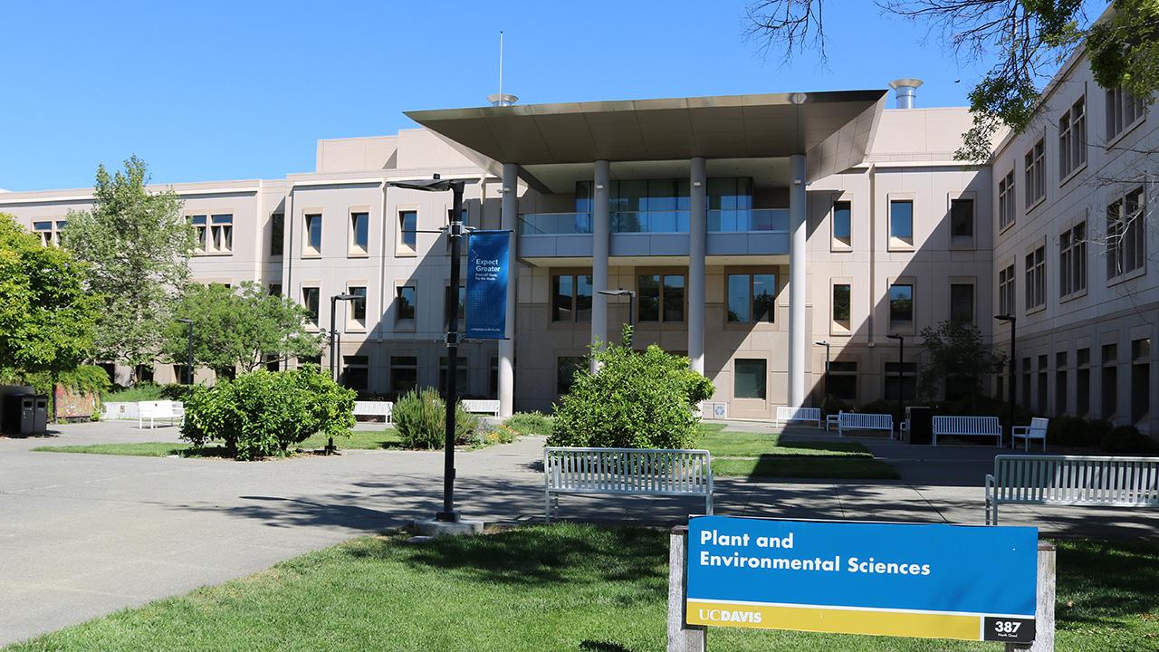 Building with sign in front saying "Plant and Environmental Sciences"