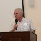 A  man speaking at a podium